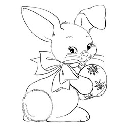 Кролик с раскрашенным пасхальным яйцом